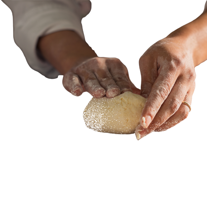 Mãos preparando pão